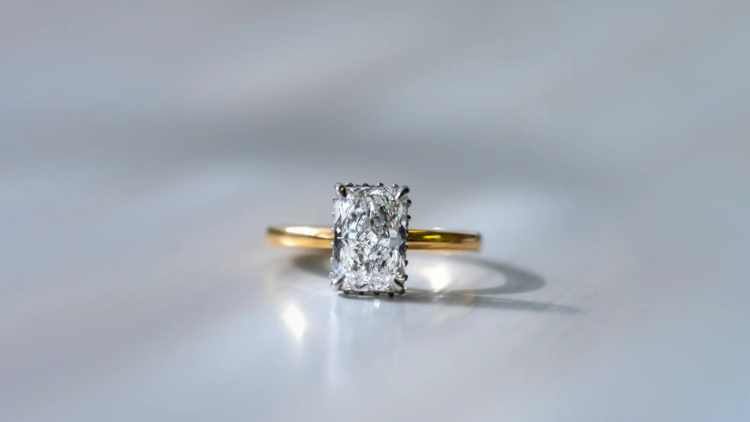 Custom designed hidden halo diamond engagement ring made by Murphy Jewellers Kilkenny
